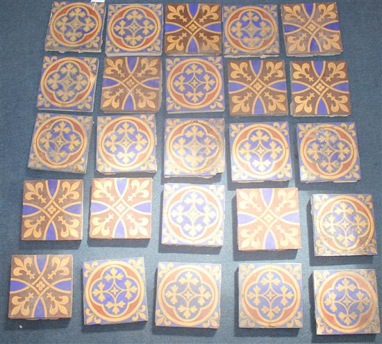 Twenty five Minton & Co encaustic floor tiles, 19th century, 15cm sq., old mortar